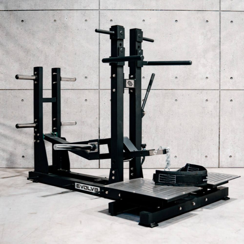 EVOLVE FITNESS - PLATED LOADED BELT SQUAT MACHINE - TÁRCSASÚLYOS GUGGOLÓ GÉP