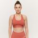 GYMBEAM - NŐI LIMITLESS SPORTMELLTARTÓ CINNAMON - NARANCSSÁRGA