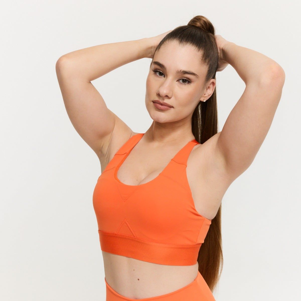 GYMBEAM - NŐI LIMITLESS SPORTMELLTARTÓ ORANGE - NARANCSSÁRGA